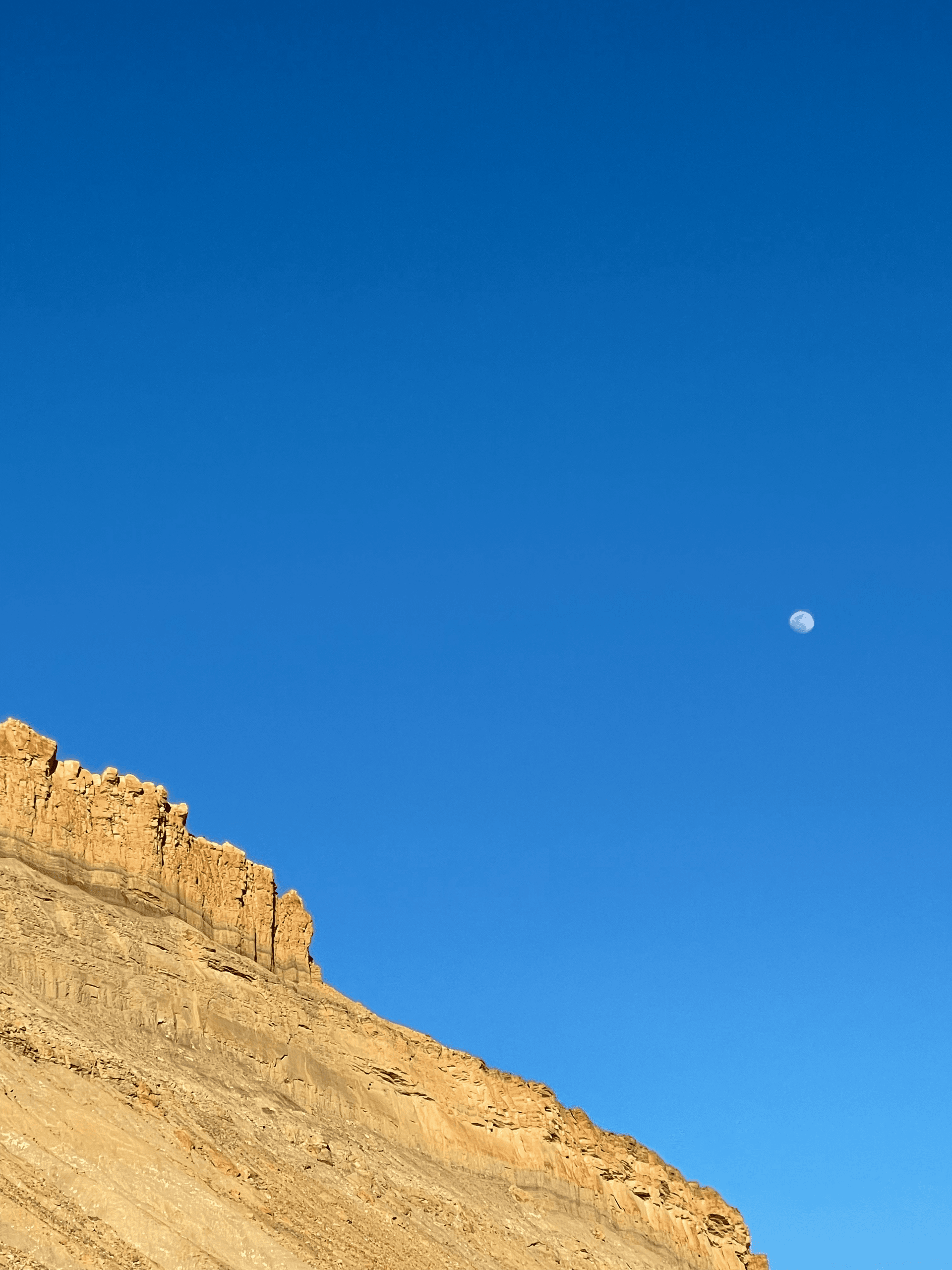 moon over cliff